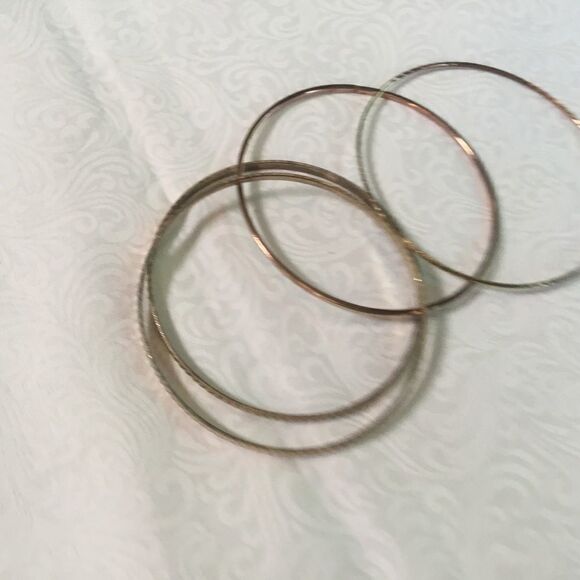 Set of 4 Goldtone Bangle Bracelets - Picture 1 of 5
